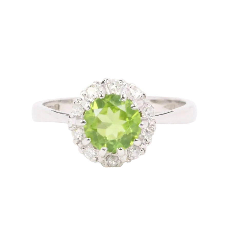 Bague Péridot entourage en or blanc et diamants - Castafiore