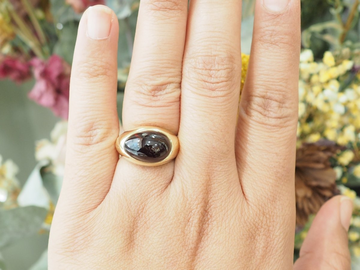 Bague POMELLATO en or jaune et grenat - Castafiore