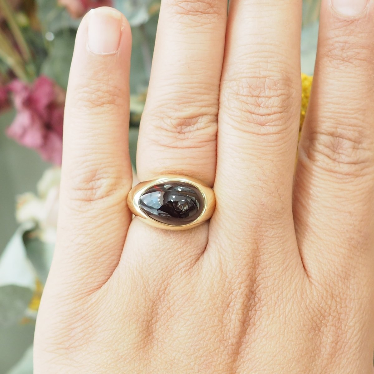 Bague POMELLATO en or jaune et grenat - Castafiore