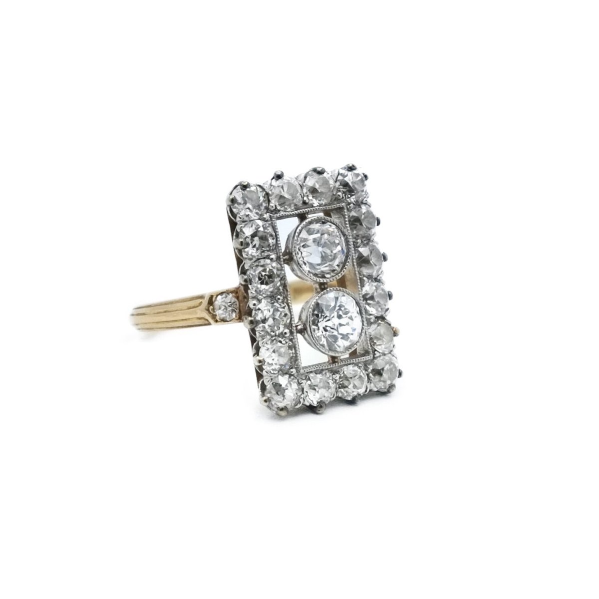 Bague rectangle en or jaune et or gris avec diamants - Castafiore