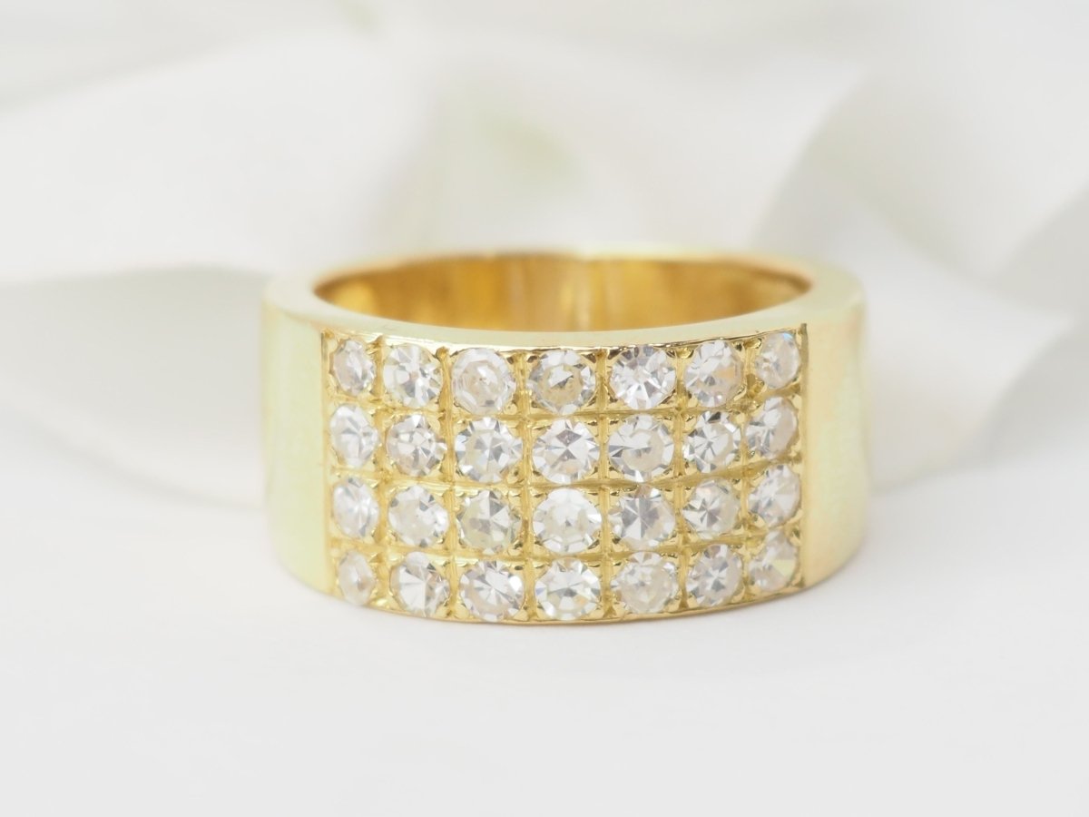 Bague ruban en or jaune et diamants - Castafiore