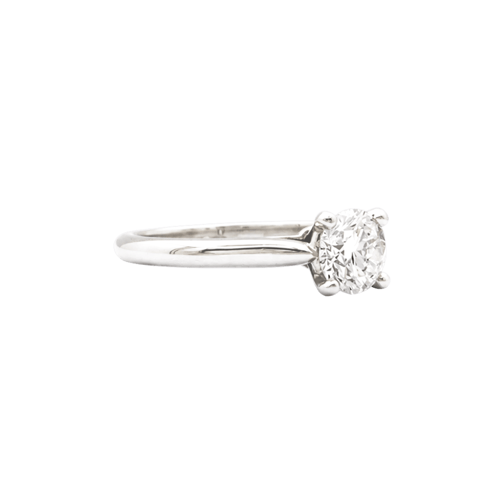Bague Solitaire CARTIER "1895" en platine et diamant - Castafiore