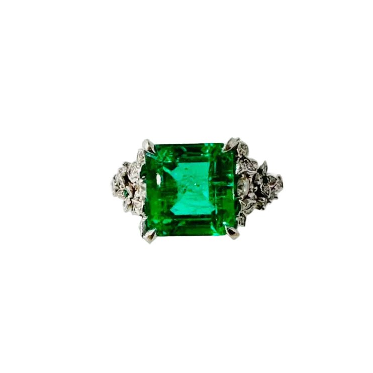 Bague Solitaire en or blanc, émeraude et diamants - Castafiore