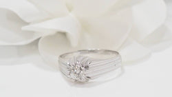 Bague solitaire en or blanc et diamant