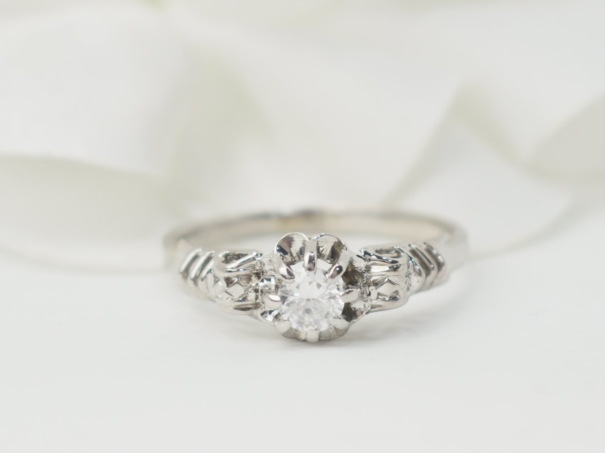 Bague solitaire en or blanc et platine, diamant 0,23ct - Castafiore