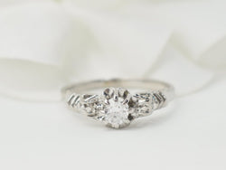 Bague solitaire en or blanc et platine, diamant 0,23ct - Castafiore