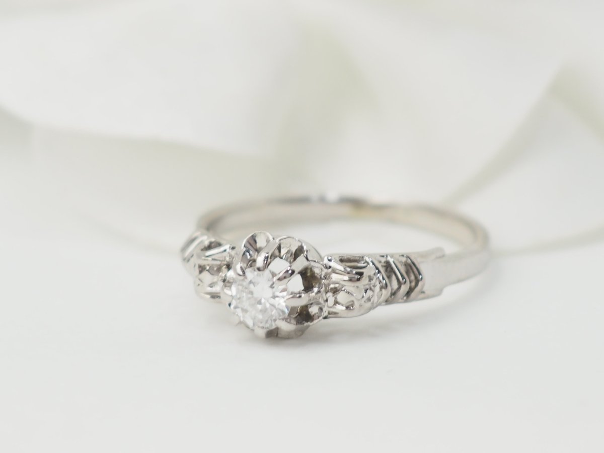 Bague solitaire en or blanc et platine, diamant 0,23ct - Castafiore