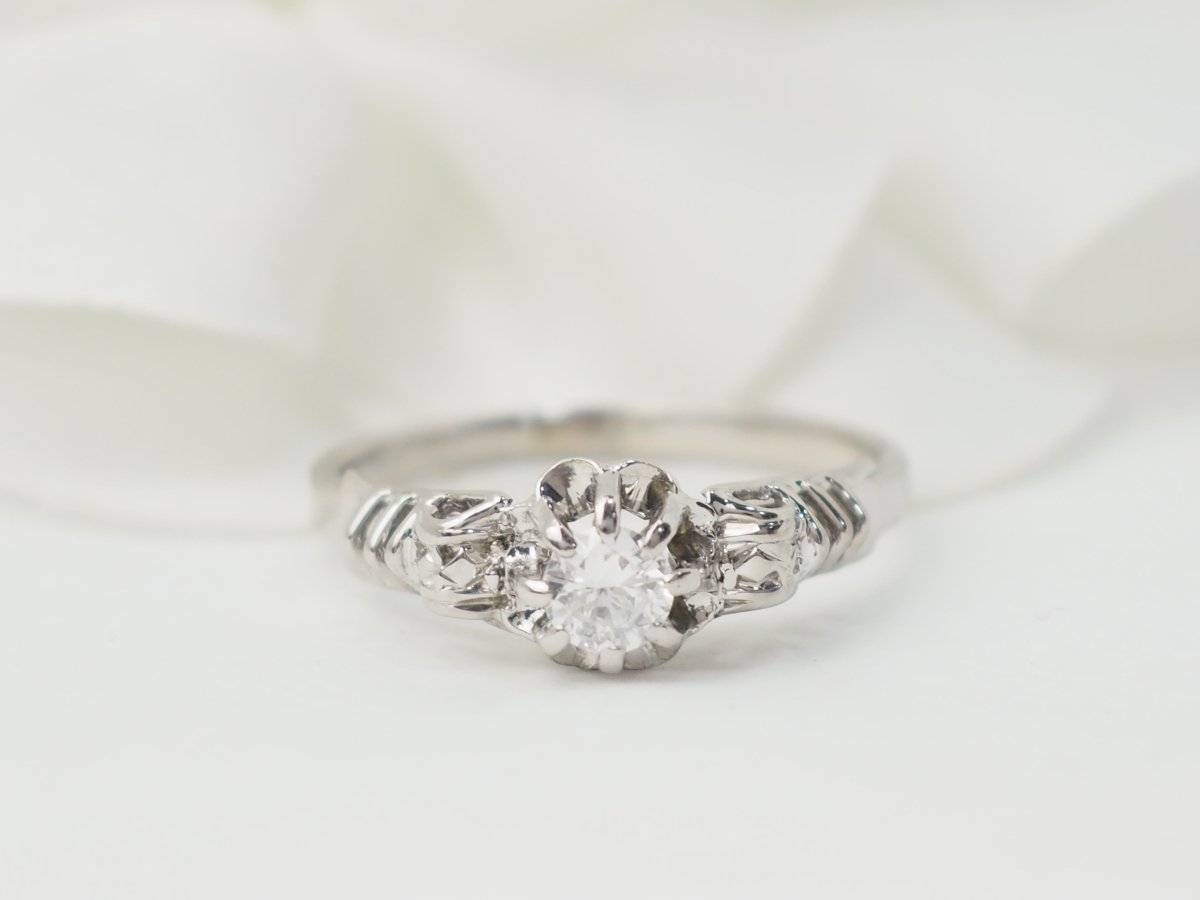 Bague solitaire en or blanc et platine, diamant 0,23ct - Castafiore