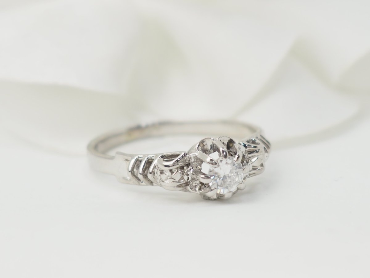 Bague solitaire en or blanc et platine, diamant 0,23ct - Castafiore