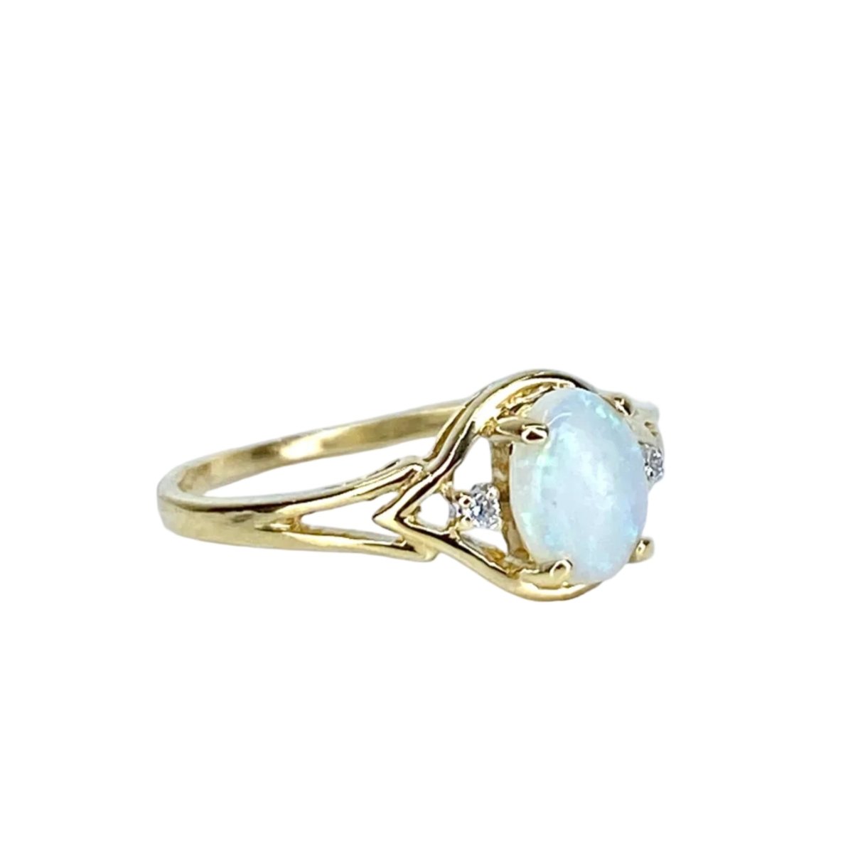 Bague Solitaire en or jaune, opale et diamants - Castafiore