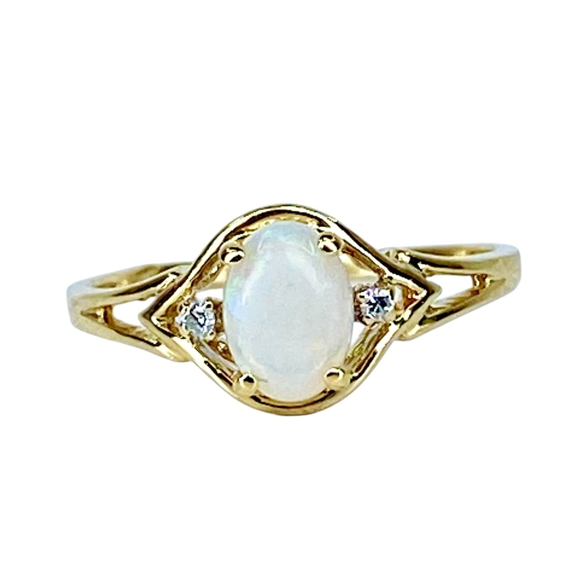 Bague Solitaire en or jaune, opale et diamants - Castafiore