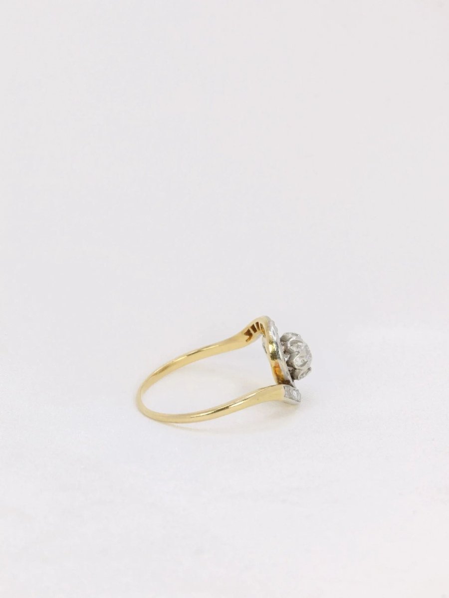 Bague tourbillon en or et diamant taille ancienne - Castafiore