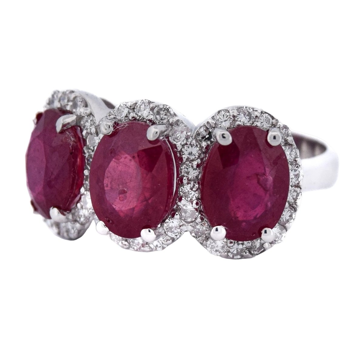 Bague Trilogie en or blanc, rubis et diamants - Castafiore