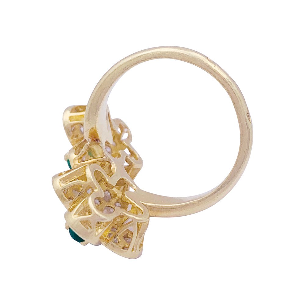 Bague Van Cleef & Arpels, "Fleurette", en or jaune, diamants et émeraudes. - Castafiore