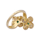 Bague Van Cleef & Arpels, "Fleurette", en or jaune, diamants et émeraudes. - Castafiore