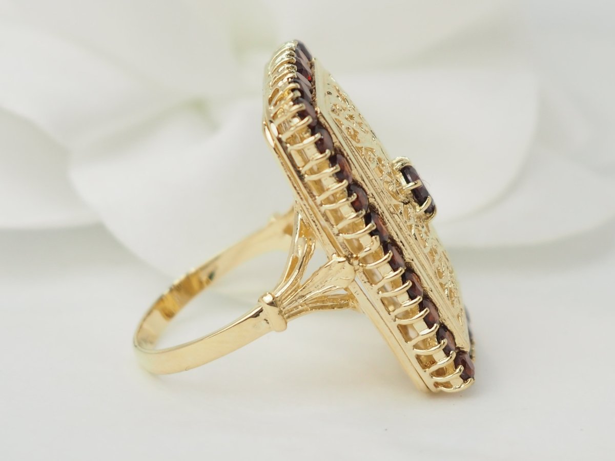 Bague vintage en or jaune et grenats - Castafiore
