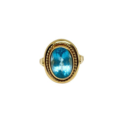 Bague Vintage imposante en or jaune et topaze bleue - Castafiore