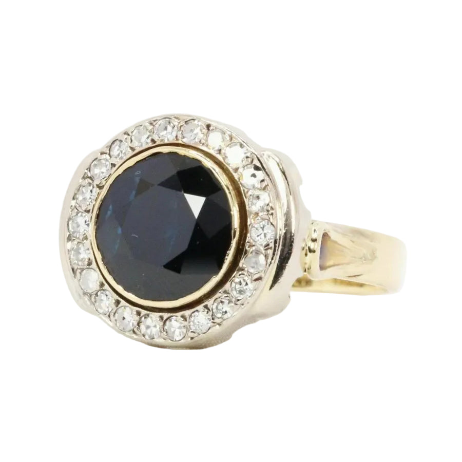 Bague vintage saphir entourage diamants - Castafiore