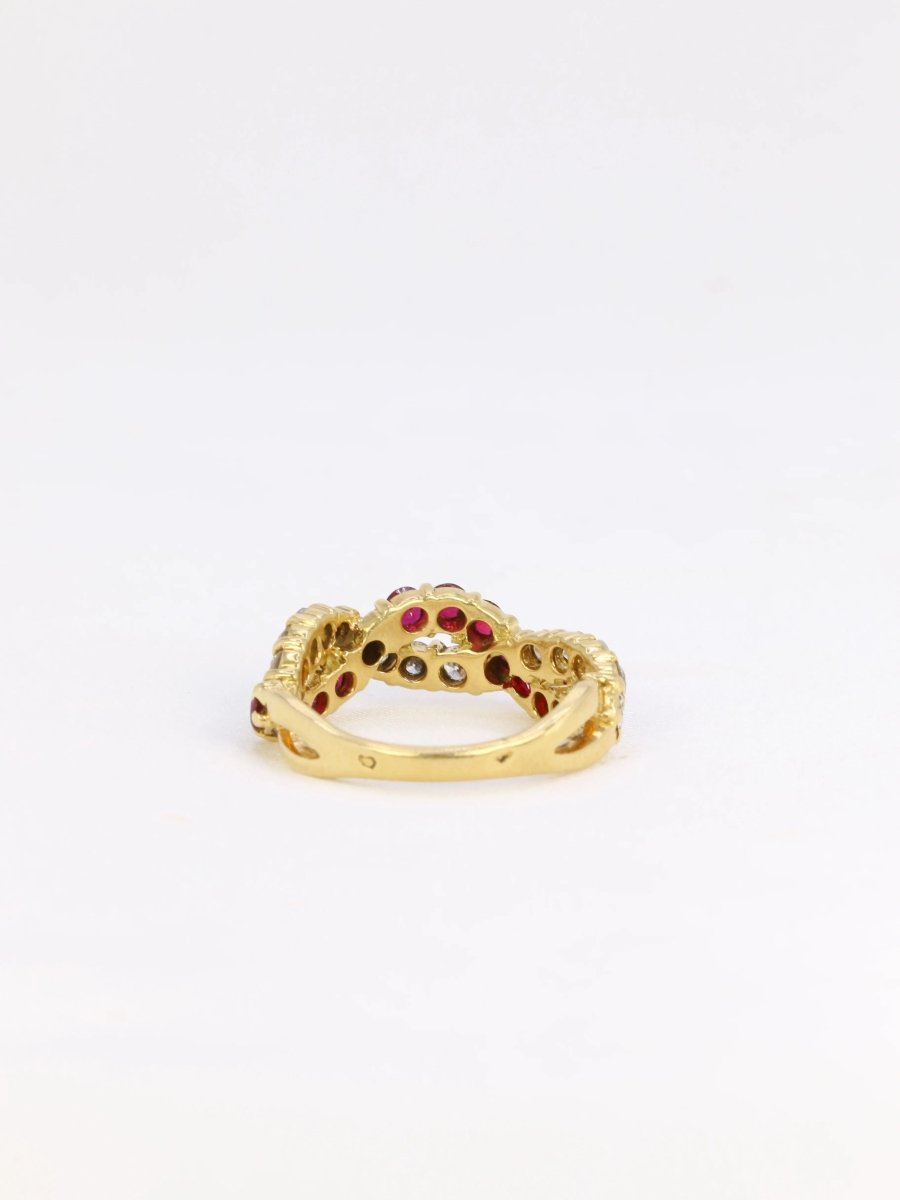 Bague vintage torsadée en or, diamants et rubis - Castafiore