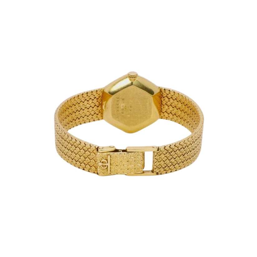 BAUME & MERCIER Montre vintage or jaune maille tressée - Castafiore