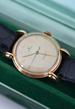 Montre ROLEX "Chronomètre" en or rose, acier et cuir