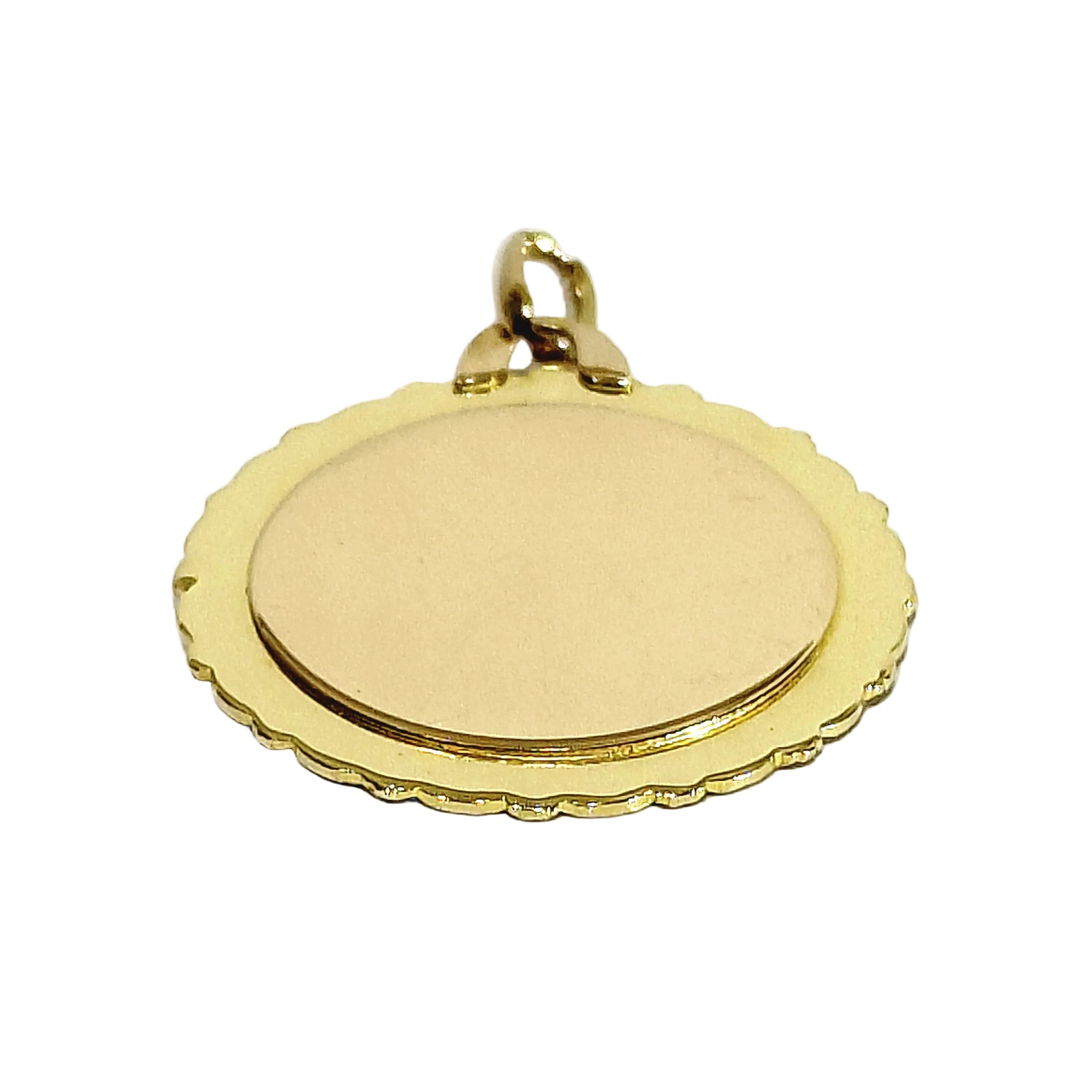 Médaille AUGIS en or jaune, or rose, rubis et diamant