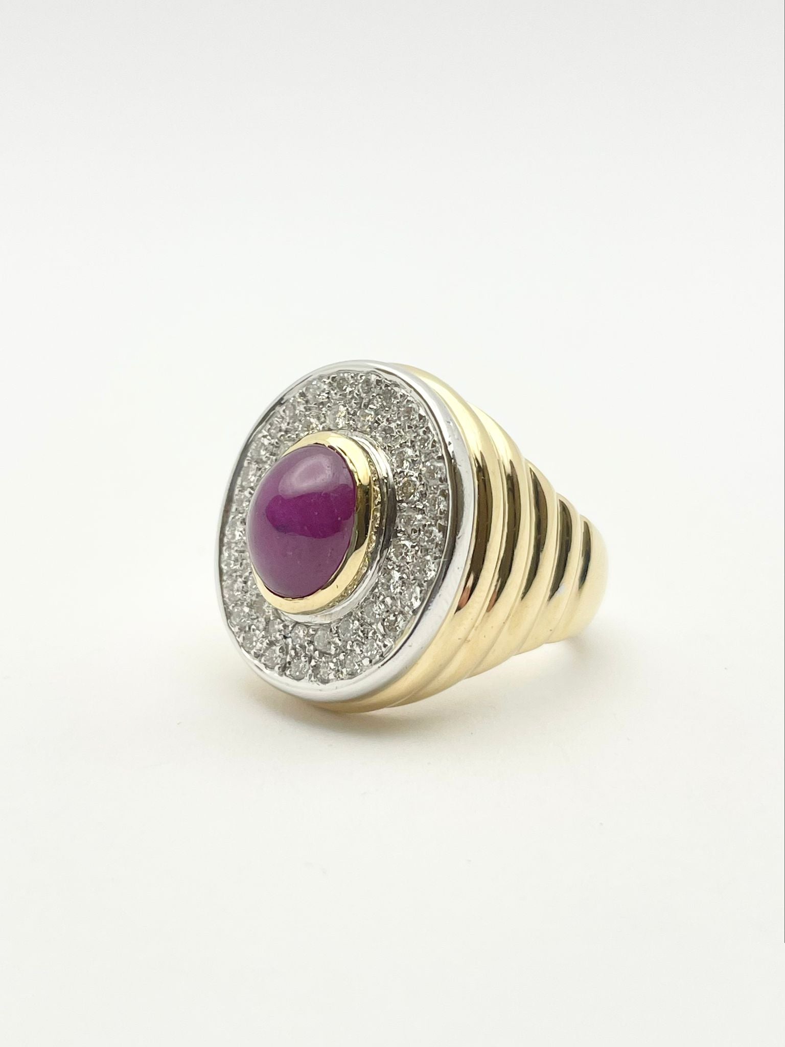 Bague Cocktail en or blanc, or jaune, rubis et diamants
