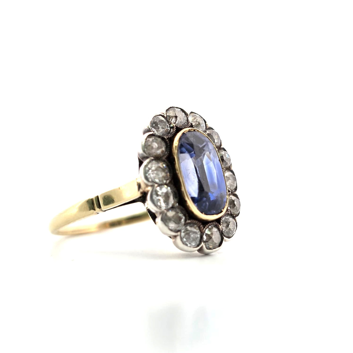 Bague Entourage en or jaune, argent, saphir et diamants