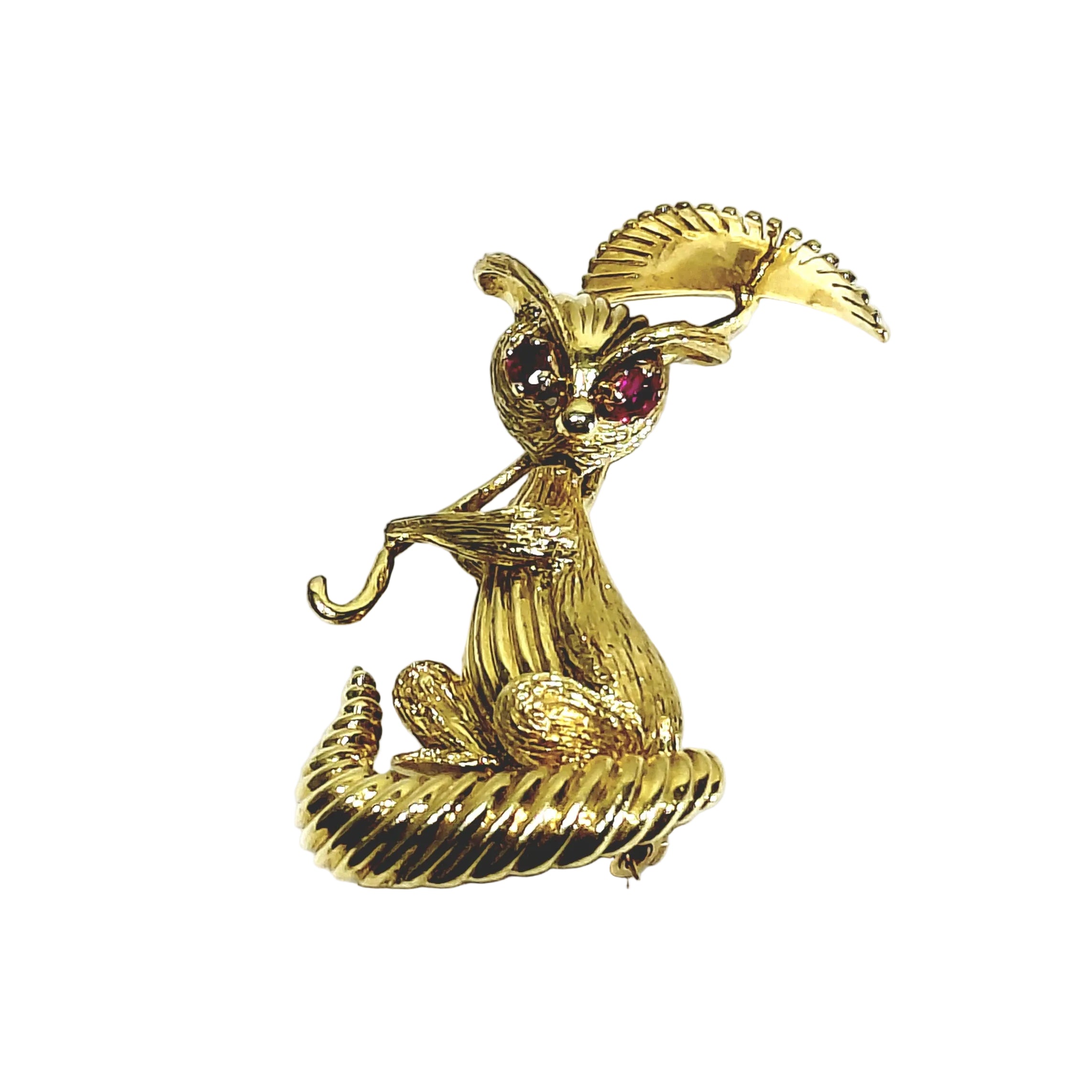 Broche en or champagne et rubis