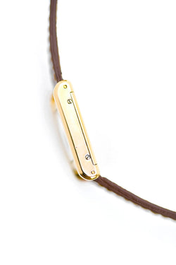 Montre CARTIER "Tank" en or jaune et cuir