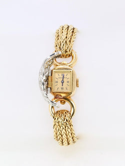 BOUCHERON Montre à secrets or jaune diamants - Castafiore