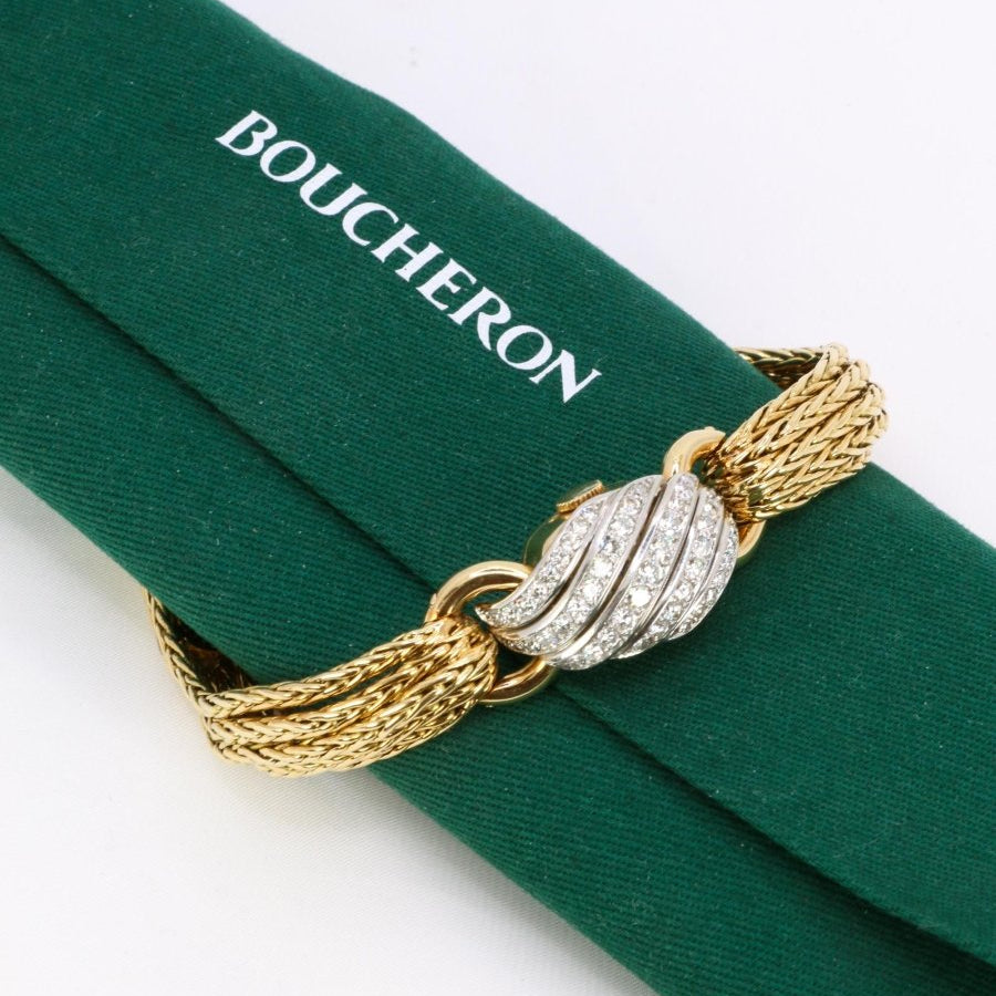 BOUCHERON Montre à secrets or jaune diamants - Castafiore