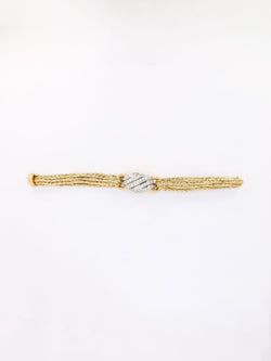 BOUCHERON Montre à secrets or jaune diamants - Castafiore