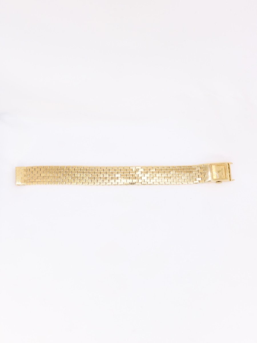 BOUCHERON Montre vintage or jaune - Castafiore