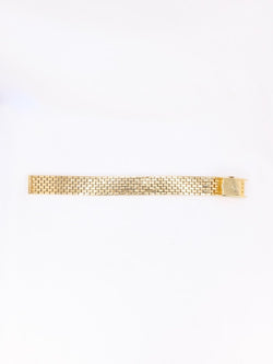 BOUCHERON Montre vintage or jaune - Castafiore