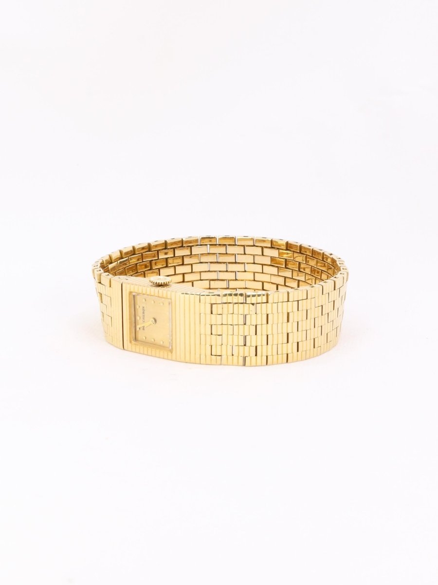 BOUCHERON Montre vintage or jaune - Castafiore