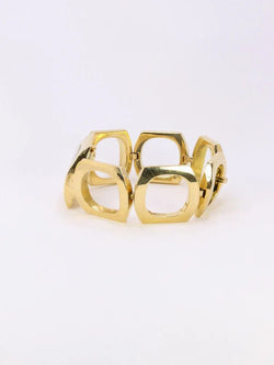 BOUCHERON Montre vintage or jaune maillons carrés arrondis - Castafiore