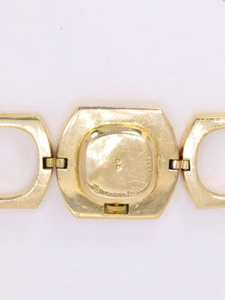 BOUCHERON Montre vintage or jaune maillons carrés arrondis - Castafiore