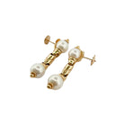 Boucle d'oreilles Pendantes BULGARI en or jaune et perles - Castafiore