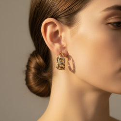 Boucles d’Oreilles CARTIER "Bergame" en or jaune et diamants - Castafiore