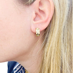Boucles d'oreilles Chanel, "Matelassé" en or jaune et diamants. - Castafiore
