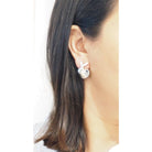 Boucles d'oreilles CHAUMET "Double Liens" en or blanc et diamants - Castafiore