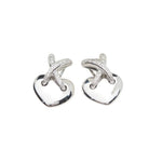 Boucles d'oreilles CHAUMET "Double Liens" en or blanc et diamants - Castafiore