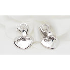 Boucles d'oreilles CHAUMET "Double Liens" en or blanc et diamants - Castafiore