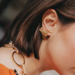 Boucles d'oreilles Clip HERMÈS Nœud en or jaune et or blanc