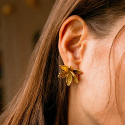 Boucles d'oreilles Clips BOUCHERON "Fleur de lotus" en or jaune - Castafiore