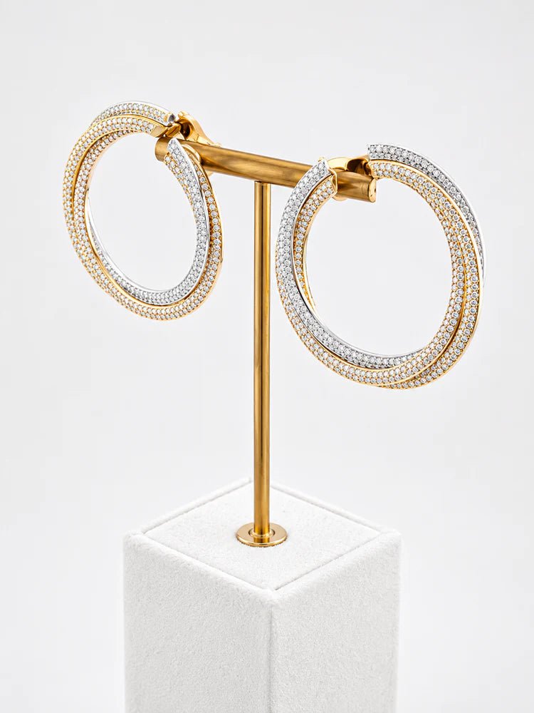 Boucles d’oreilles Clips CARTIER "Trinity" en or blanc, or jaune, or rose et diamants - Castafiore