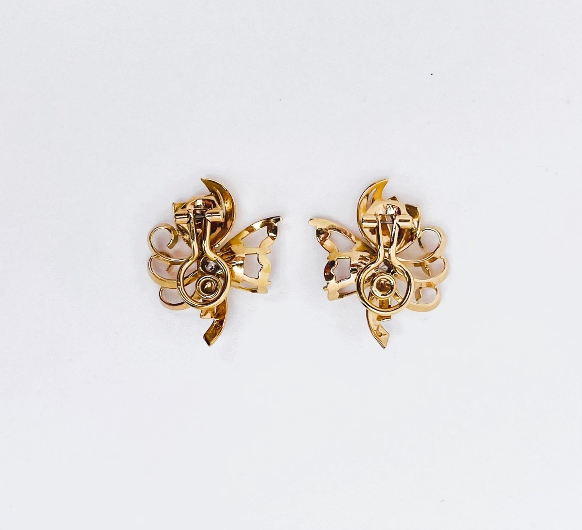 Boucles d'oreilles clips fleur diamants en or jaune et platine - Castafiore