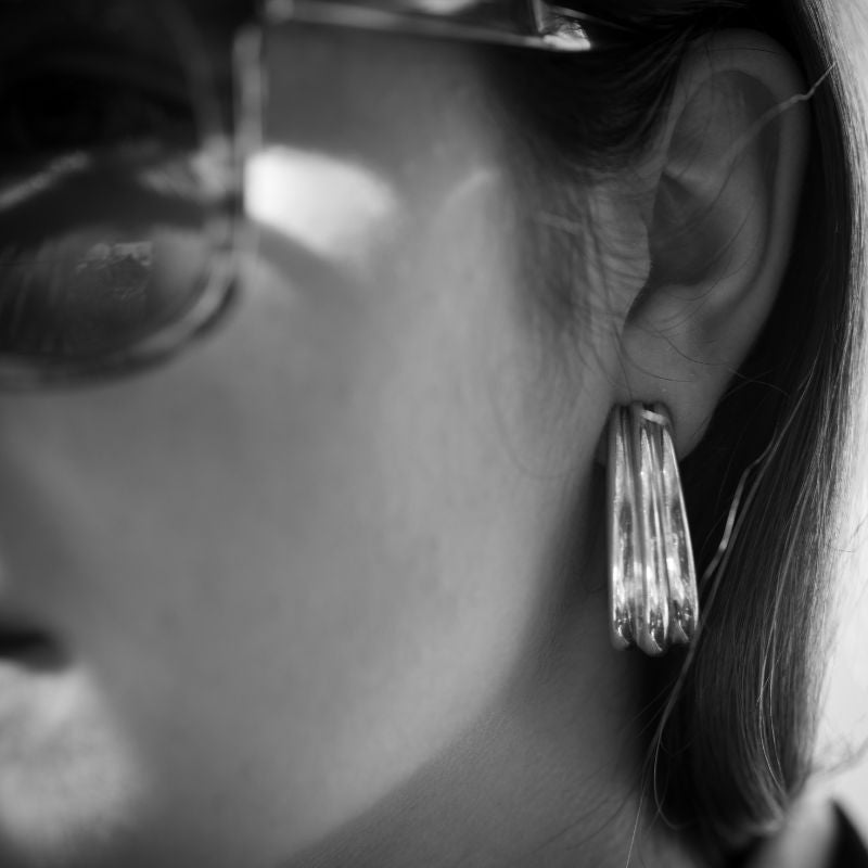 Boucles d'oreilles clips HERMÈS en argent - Castafiore