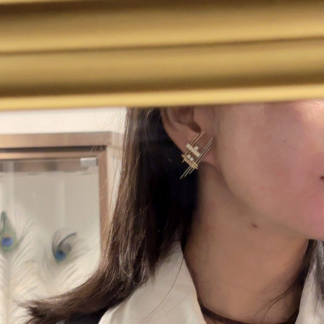 Boucles d'oreilles Clips WOLFERS en or jaune, platine et diamants - Castafiore